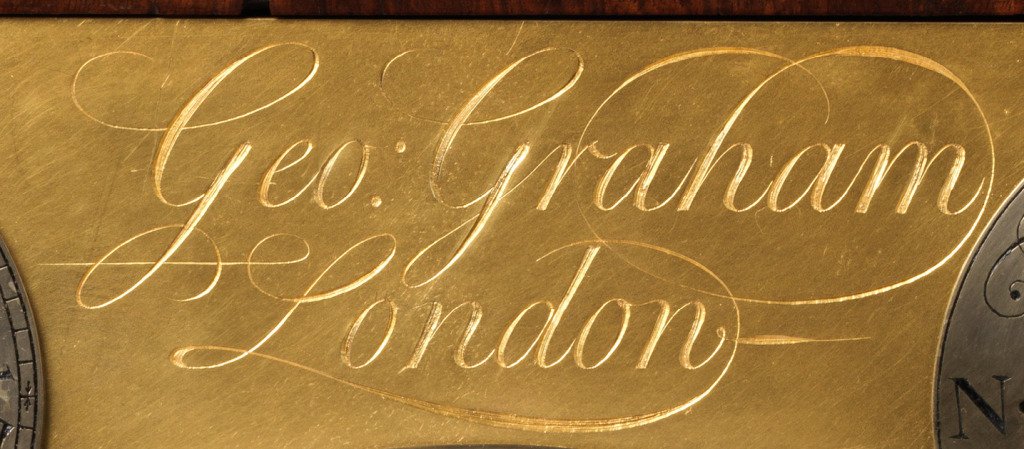 The engraved signature 'Geo: Graham London' on a clock backplate