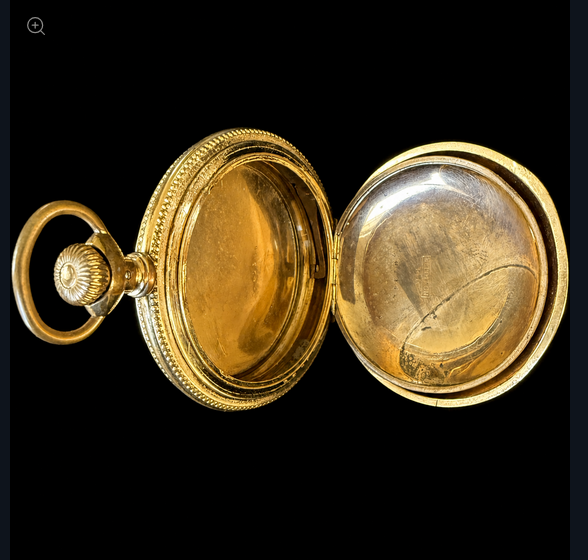 An antique gold hunter pocket watch case opened to show its construction — the hinged front cover and the back case interior, both empty after the movement and dial have been removed