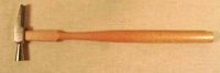 Watchmaker's small brass and steel hammer with wooden handle