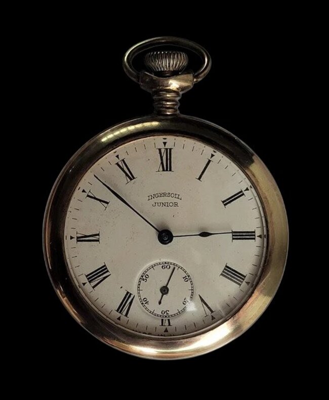 Ingersoll Junior pocket watch, c.1929 — gold-tone open-face case, white enamel dial, Roman numerals, subsidiary seconds at 6