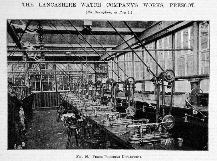 Photograph of a long bench of pinion-polishing machines driven by overhead belts
