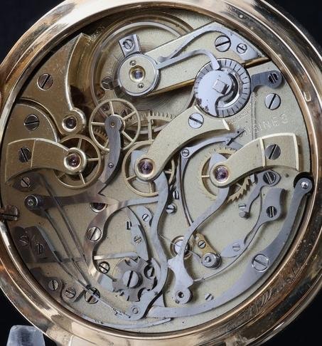 Longines chronograph movement showing the column wheel, hammers and levers