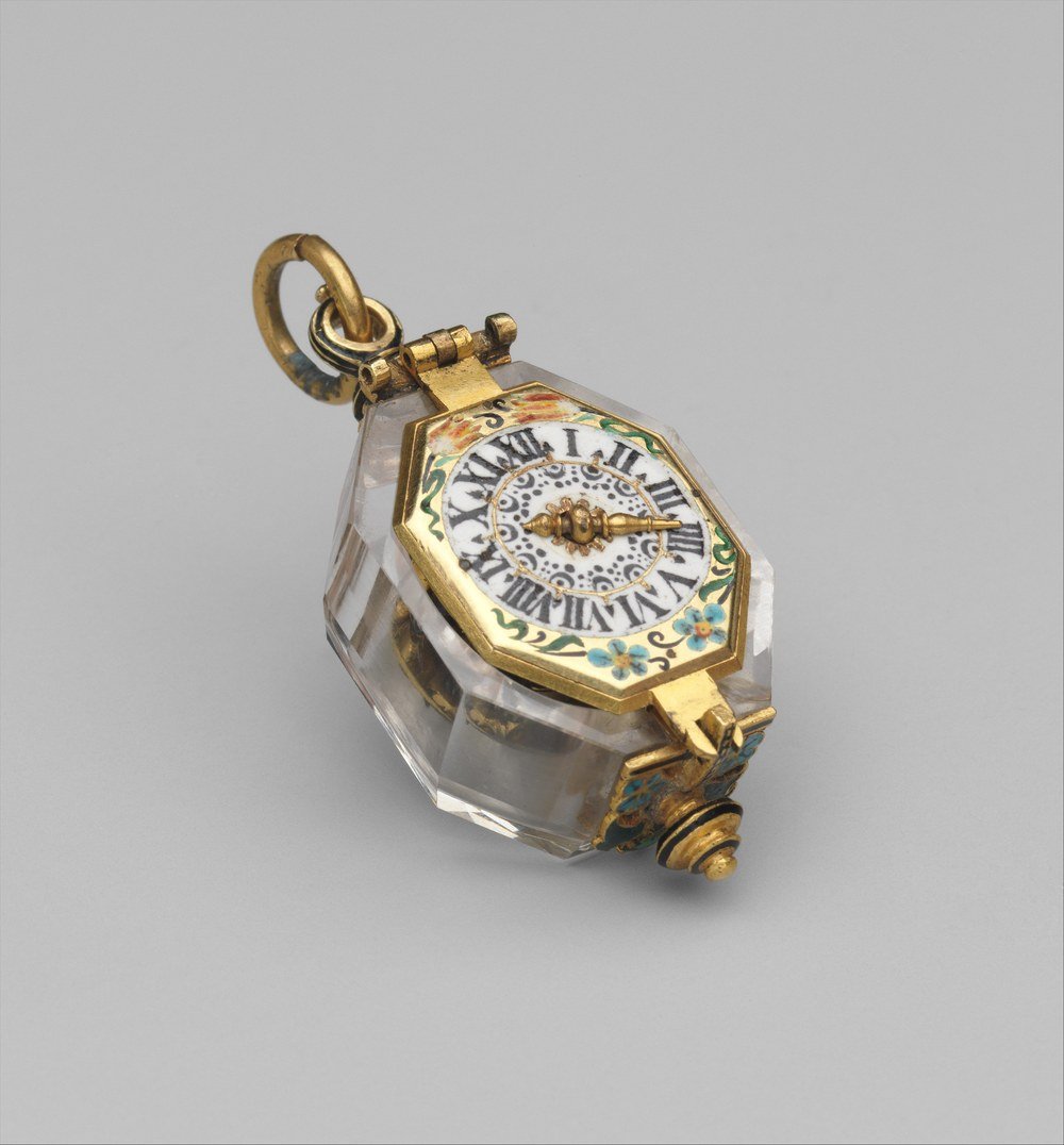 Octagonal rock-crystal pendant watch with a single gilt hand on an enamelled dial